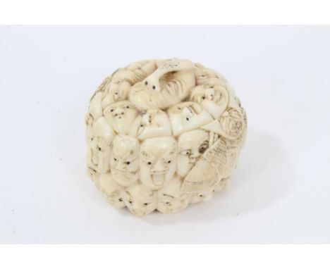 Meiji period ivory trinket box carved with 33 character masks from the Noh Theatre, detachable inset cover engraved on inside