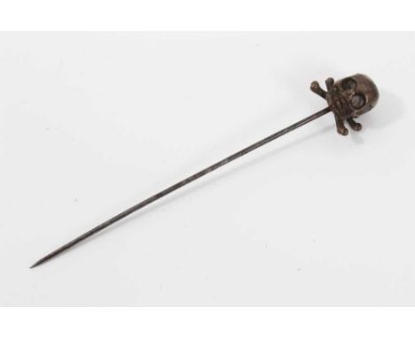 Victorian momento mori stick pin with brass skull and cross bones on a steel pinCondition report: The skull and crossed bones