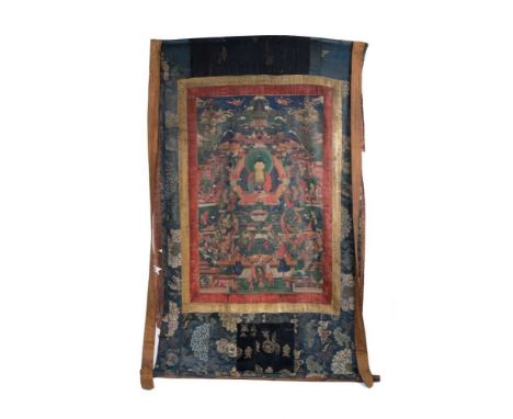 Early Tibetan thangka, distemper on cloth, within a cloth border, painted with an extensive scene of gods and holy men, total