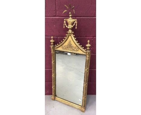Regency style gilt wood and gesso pier mirror, with rectangular plate between projecting cluster columns, the arched tablet c