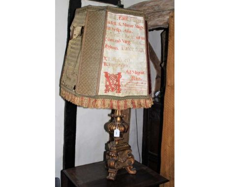 19th century Italian carved giltwood torchére, converted to a lamp, typical knopped form on triangular base and scrolled feet