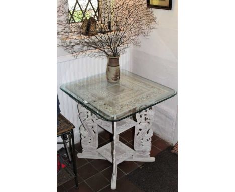 Indian white painted carved side table, with square top on pierced carved bracket supports and undertier, 66cmProvenance: The