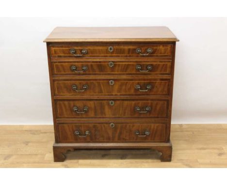 Georgian mahogany and boxwood line inlaid secretaire chest, with secretaire drawer with fall front and three graduated drawer