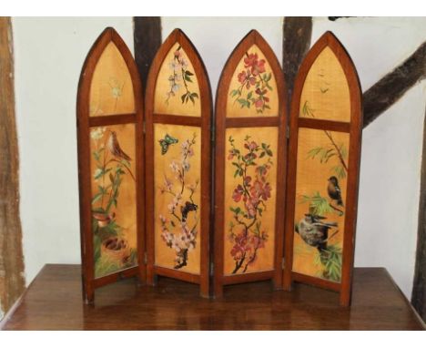 Early 20th century painted wooden four folding fire screen, each arched panel painted with animals and flowers, each panel 71