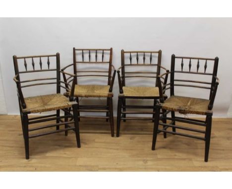 Set of four 19th century beech and ash stick back country elbow chairs, each with bobbin turned top rail and rush seat on tur