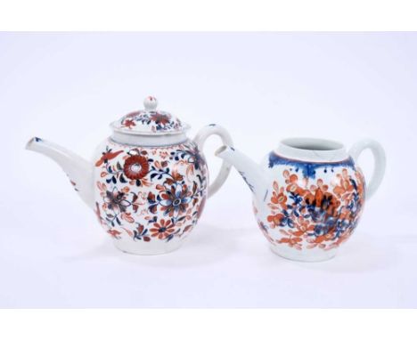 Large Lowestoft teapot and cover, painted with trailing flowers in underlaze blue, red enamel and gold, 16.5cm high, and a si