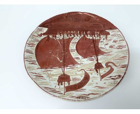 William de Morgan tazza, c.1890, decorated in red lustre with a galleon by Charles Passenger, signed 'W.D.M Fulham' to base, 