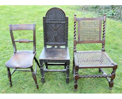 17th century carved oak side chair with arched geometric panel back and solid seat, on carved and turned understructure, toge