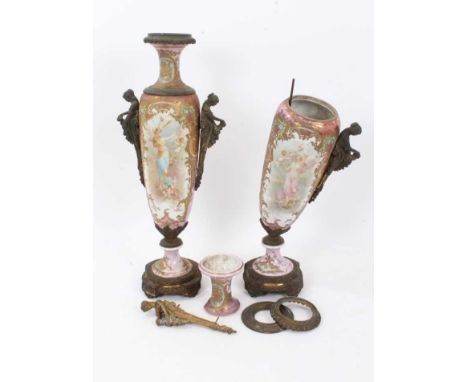 Pair of late 19th century Sèvres style ormolu mounted porcelain vases, each of slender form with twin female bracket handle, 