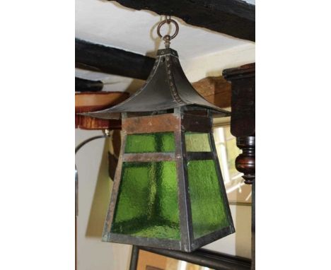Art and crafts anodised copper lantern in the manner of Benson, loop suspension and pagoda roof, of flared form with green te