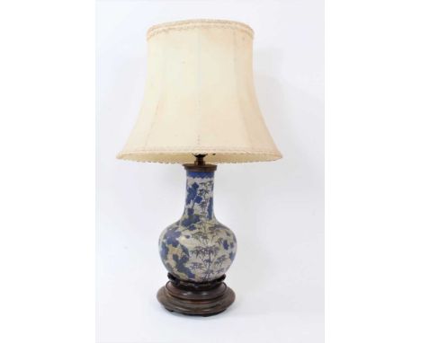 Japanese cloisonné vase table lamp, squat baluster form, with blue foliage on white ground and lattice metalwork, raised on w