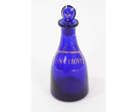 Very rare Regency cobalt blue miniature decanter and stopper with gilt ornament, titled 'anchovy', 12cm high