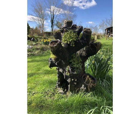 19th century Scottish ceramic planter in the form of a gnarled tree truck, 90cm highProvenance: The Robert Barley Collection