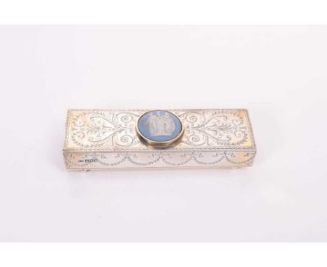 Edwardian silver match box holder of rectangular form with engraved decoration and central Jasperware panel inset to the top,