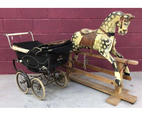 Antique painted wooden rocking horse, on sledge base, total length 118cm and a vintage child's perambulatorCondition report: 