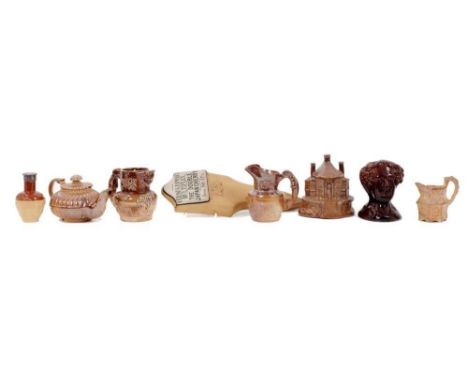 Interesting collection of 19th century stoneware, including a Bourne tree stake with inscribed label, a salt-glazed cottage, 