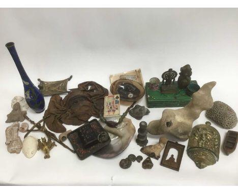 Collection of antique, natural history and found objects, including brass holy water stoop, ancient terracotta fragments, ony