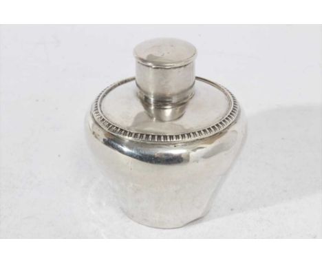Edwardian silver tea caddy of tapered form with gadrooned border and slip on cover, (Birmingham 1906), maker Henry Bushell &a