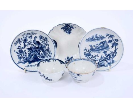 Lowestoft tea bowls and saucers, including a tea bowl painted in blue with trailing flowers, another printed with flowering p