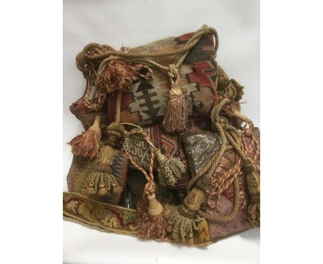 Collection of antique and decorative textiles to include cushions, tie-backs and antique panels, Chinese silk embroidery. (Qt