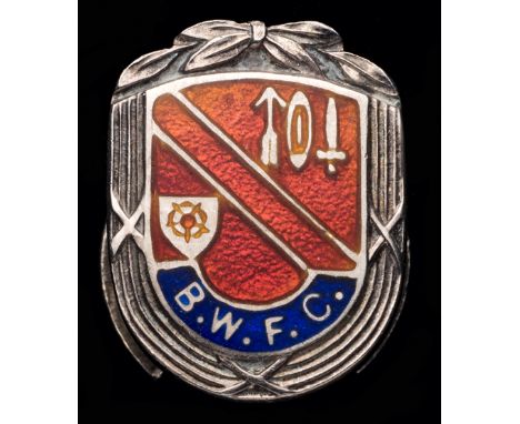 A silver & enamel lapel badge worn by Bolton Wanderers's trainer Bert Sproston at the 1953 F.A. Cup Final