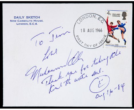 A 1966 World Cup England Winners First Day Cover signed by the World Heavyweight Boxing Champion Muhammad Ali,
inscribed TO J
