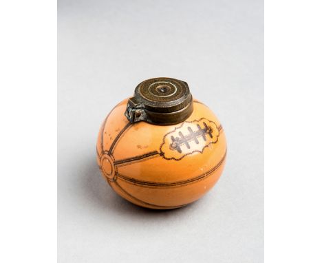 A Victorian gentlemen's ceramic inkwell modelled and decorated as a leather panelled rugby ball,
Design No.167873 registered 