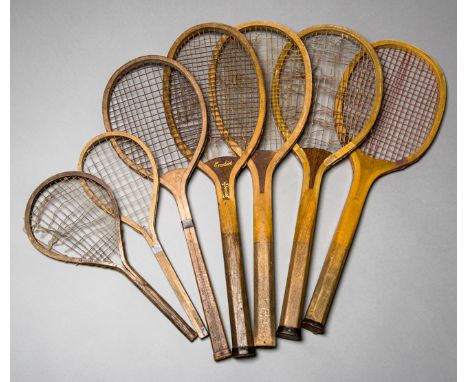 A group of seven vintage tennis racquets,
including three examples with convex wedge named "Excelsior", "The Winna" and "Voll
