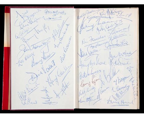 A multi-signed copy of Percy M. Young's book "Manchester United",
hardback with d/j, Sportsman's Book Club, 1962, signed exte