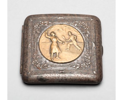 Cigarette case set with a roundel depicting a lady and gentleman playing tennis circa 1920s,
white metal with bronzed roundel