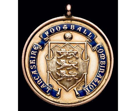 A Lancashire Football Combination medal awarded to a Rochdale player in season 1911-12,
in 9ct. gold & enamel, inscribed LANC