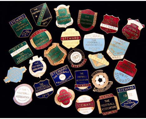 A group of 26 gilt-metal & enamel Football Association Steward's badges from the 1970s and 1980s,
each inscribed THE FOOTBALL