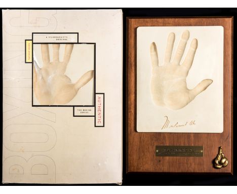 The handprints of Muhammad Ali and Larry Holmes,
from the Boxing Series produced by Silkroadgifts, New York, the Holmes in th