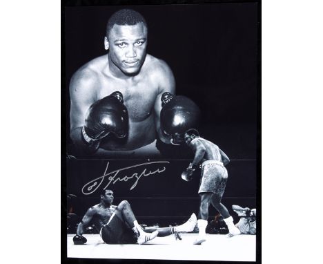 A signed b&w Joe Frazier photo print,
16 by 12in., signature in silver pen