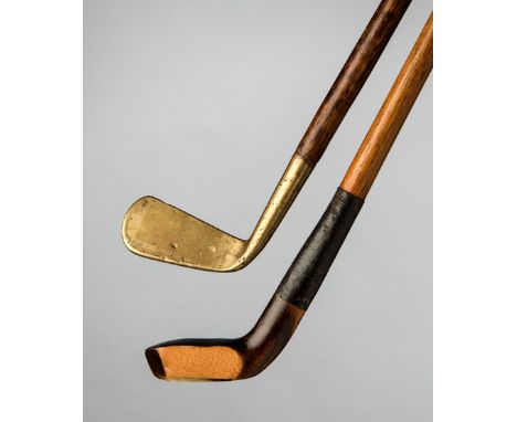 A scared-neck holly head golf club walking stick circa 1910,
and another golf club walking stick with a brass head, both with