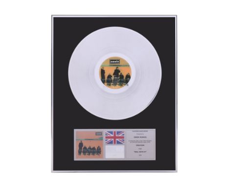 OASIS - "Roll With It" Platinum Disc Presented to Owen Morris - A platinum disc presented to record producer Owen Morris to c