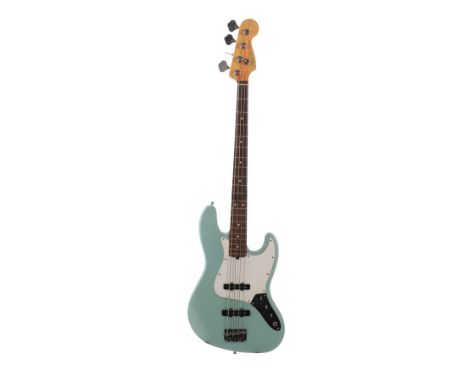 OASIS - Noel Gallagher's Owned and Autographed Sonic Blue Fender Jazz Bass Guitar Played During Feastival 1999 Performance an