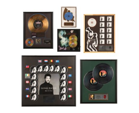 LIONEL RICHIE - Nordoff and Robbins Collection: Six Assorted Artists Disc Awards - A selection of six different-sized platinu