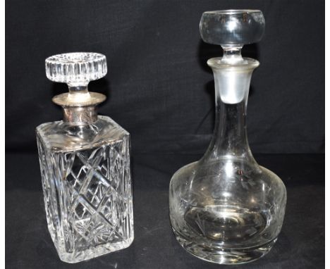 A SILVER MOUNTED GLASS DECANTER &amp; STOPPER  hallmarked JB Chatterley &amp; Sons Ltd, Birmingham 24.5cm high; together with