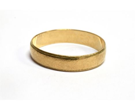 A 9 CARAT GOLD PLAIN WEDDING BAND D profile with beaded edges, 5mm wide, ring size W, gross weight 2.4 grams Condition Report