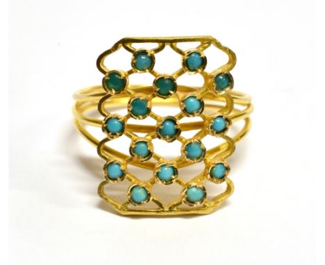 A TURQUOISE SET WIREWORK RING  the front open lattice design rectangular head set with small round cabochon cut turquoise app