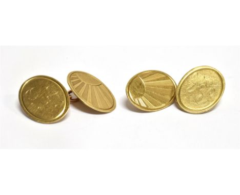 A PAIR OF 9 CARAT GOLD CHAINED CUFFLINKS  the oval cufflinks with engine turned sunray decoration, initialled 'R.A', gross we
