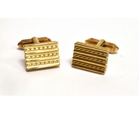 A PAIR OF 9 CARAT GOLD CUFFLINKS  rectangular engine turned pattern design, hallmarked 9ct gold, London 1972, makers mark KW,
