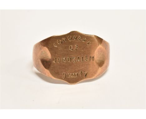 A 9CT ROSE GOLD SIGNET RING  the shield form front inscribed 'Conquest of Jerusalem XII 17', to shank stamped 9k, ring size Q