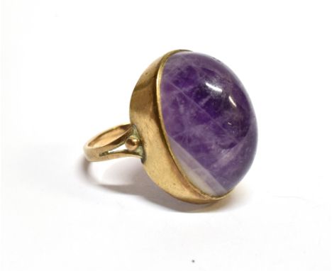 A BLUE JOHN SINGLE STONE SET 9 CARAT GOLD SIGNET RING  the large oval cabochon cut piece of blue john measuring approx. 20mm 