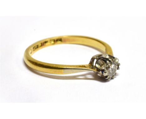 A DIAMOND SOLITAIRE 18 CARAT GOLD RING the round brilliant cut diamond weighing approx. 0.20 carat, claw setting, ring size J