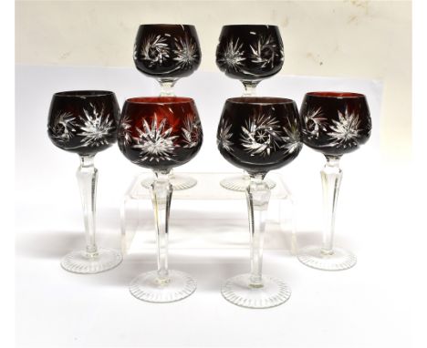 A SET OF SIX HOCK GLASSES with flash cut ruby glass bowls, 19.5cm high