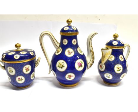 A CONTINENTAL COFFEE POT AND COVER  matching lidded milk jug and sugar basin with cover, each with painted floral roundels on