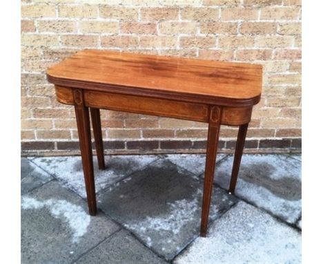 A 19TH CENTURY MAHOGANY TEA TABLE  the oblong top with reeded edge, single frieze drawer, on ring turned supports, 91cm wide 