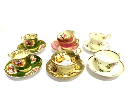 A GROUP OF SPODE AND OTHER 19TH CENTURY FLORAL DECORATED CUPS AND SAUCERS